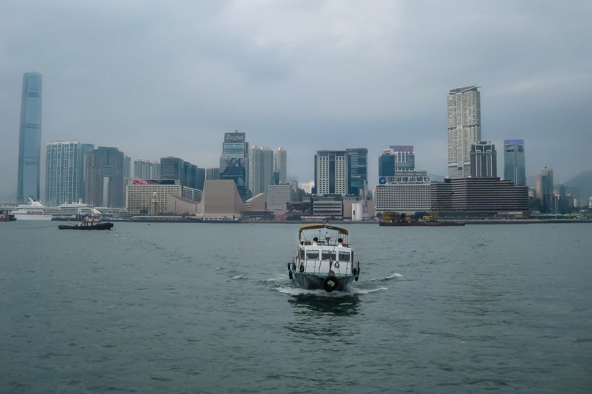 A boat leaving Victoria Harbour for Macau, Hong Kong, China.