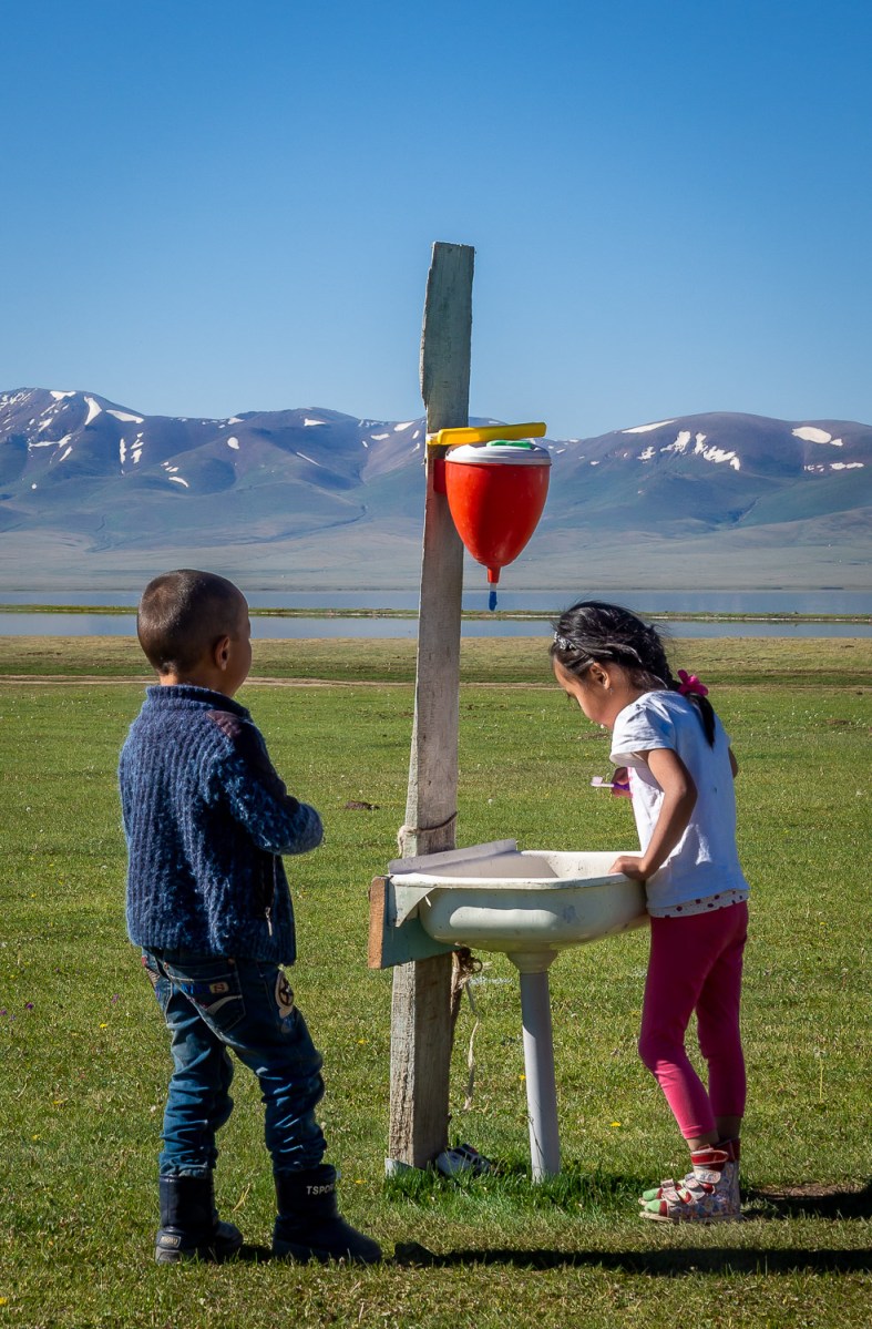 Tooth brushing, Song-Kul Lake, Kyrgyzstan.