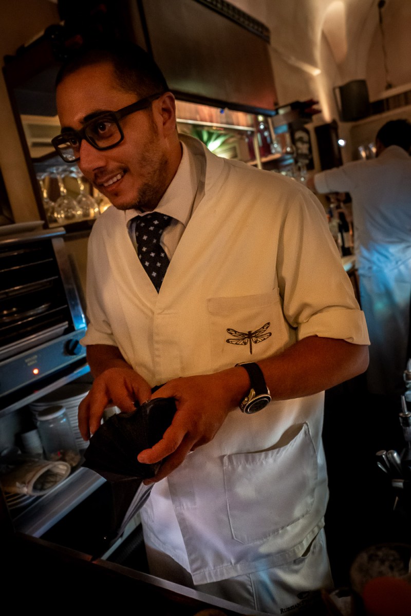 Bartender in one of many bars in Gemmayzeh, Beirut, Lebanon.