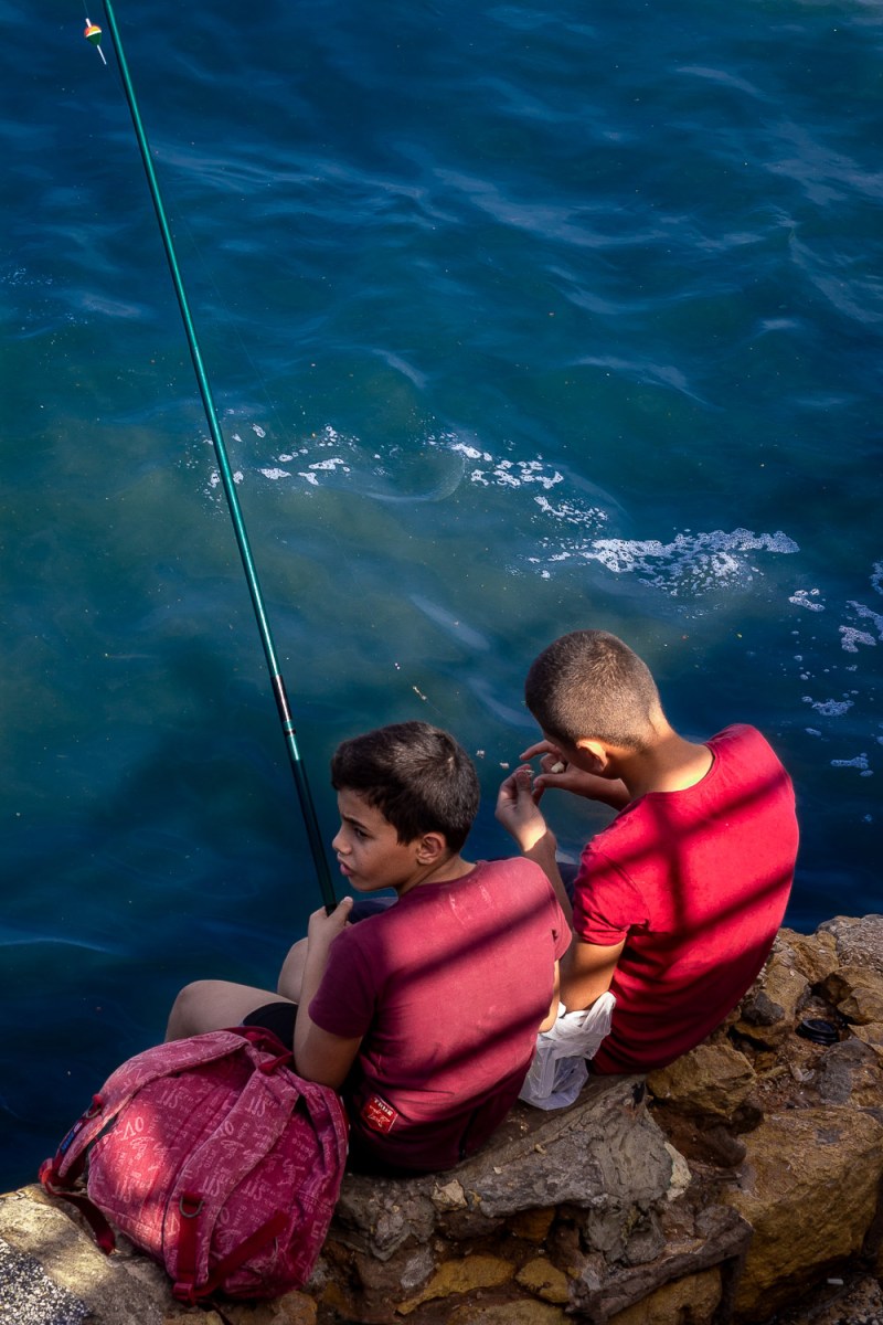Two boys fishing, La Corniche, Beirut, Lebanon.