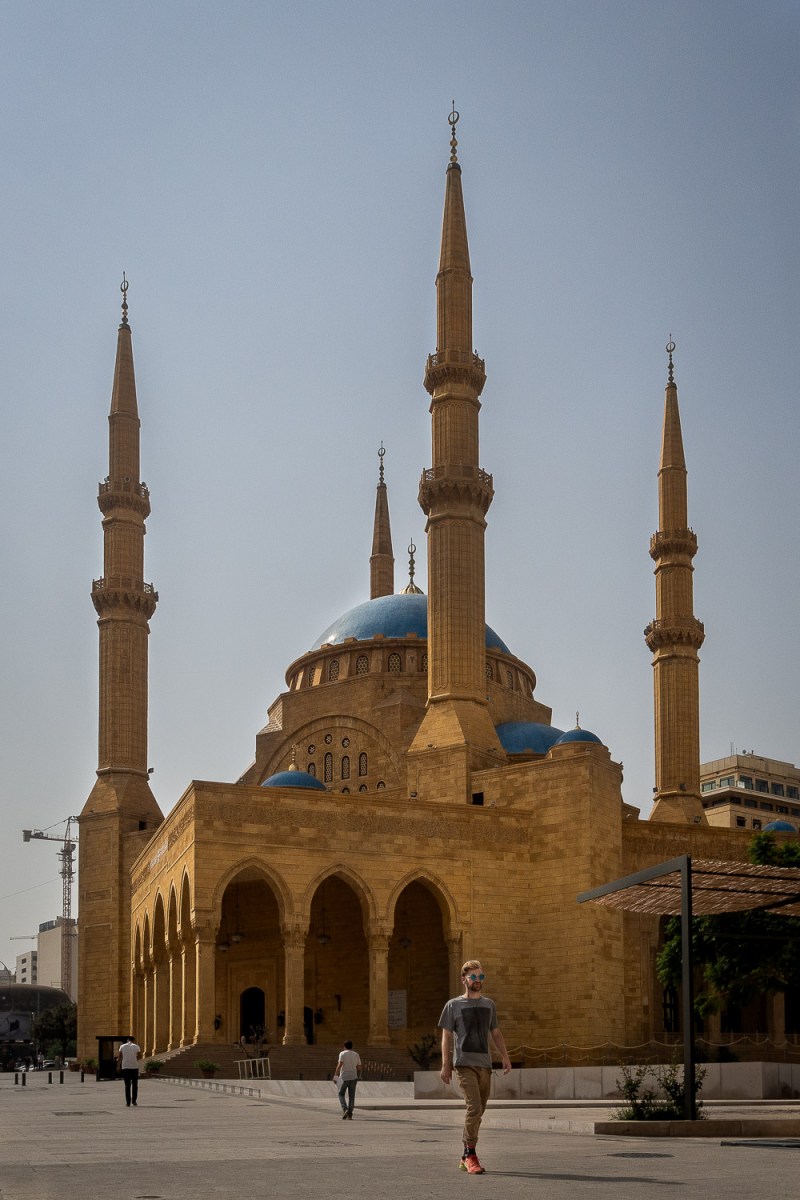Man young passing the Muhammad Al-Amin mosque, Beirut, Lebanon.