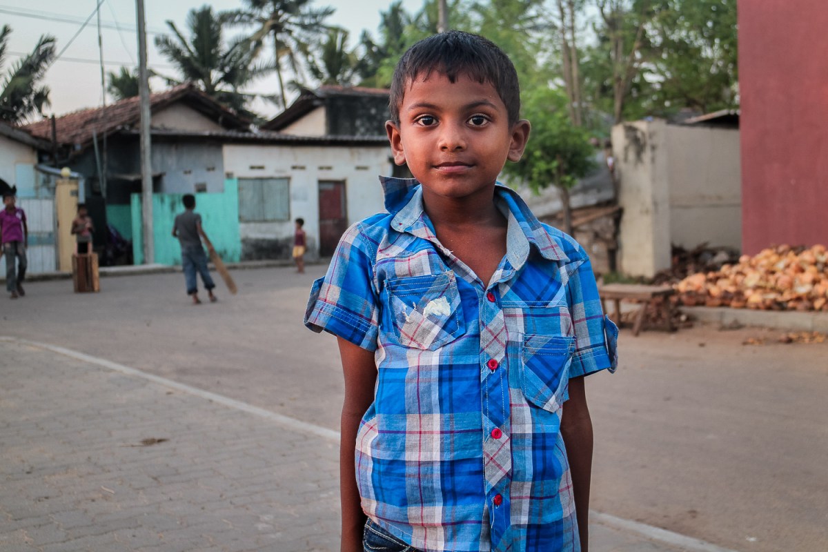 Children playing cricket, Negombo, Sri Lanka.